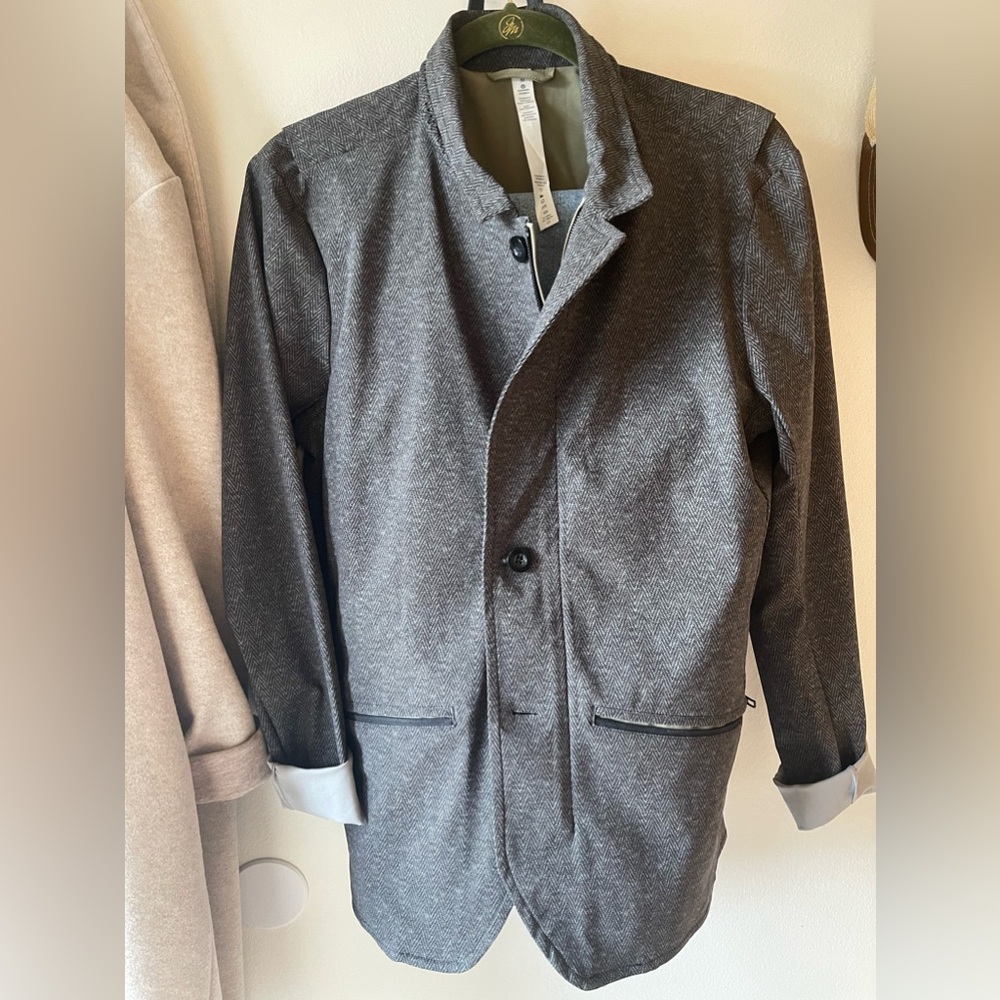 Lululemon blazer men’s jacket. Polyester size medium. Has tag & extra button.